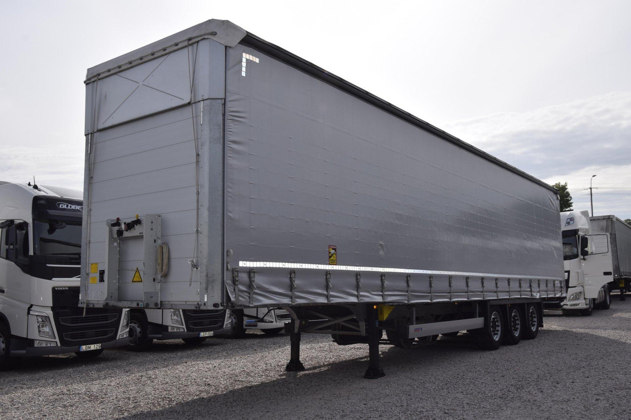 Schmitz Cargobull SCS24/L Varios - Planenauflieger: das Bild 1 Schmitz Cargobull SCS24/L Varios - Planenauflieger: das Bild 1