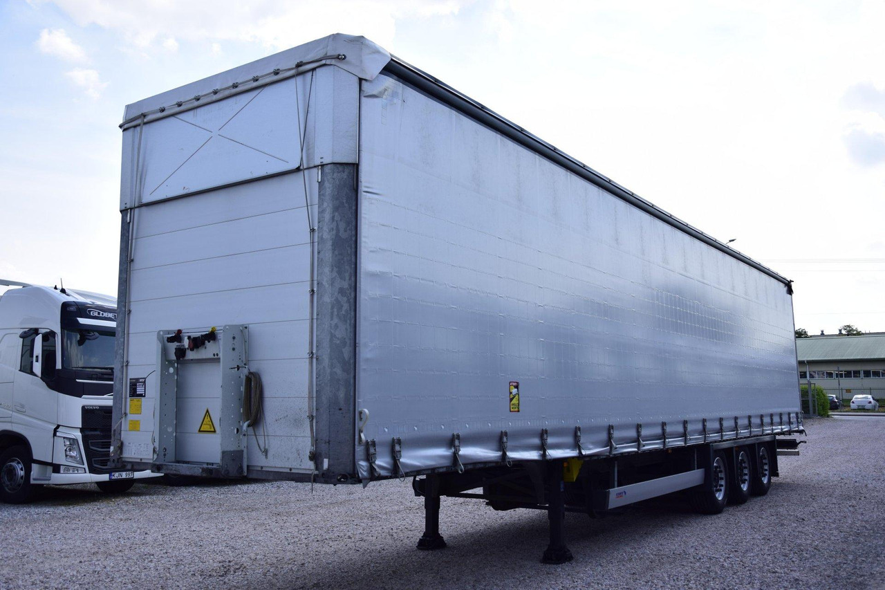 Schmitz Cargobull SCS24/L Varios - Planenauflieger: das Bild 1 Schmitz Cargobull SCS24/L Varios - Planenauflieger: das Bild 1