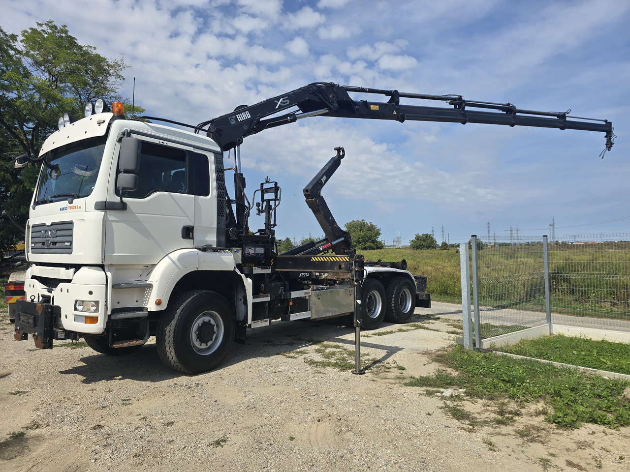 MAN TGA 26.440 6X6 / HOOK SYSTEM / HIAB 166D REMOTE - Abrollkipper, Autokran: das Bild 3 MAN TGA 26.440 6X6 / HOOK SYSTEM / HIAB 166D REMOTE - Abrollkipper, Autokran: das Bild 3