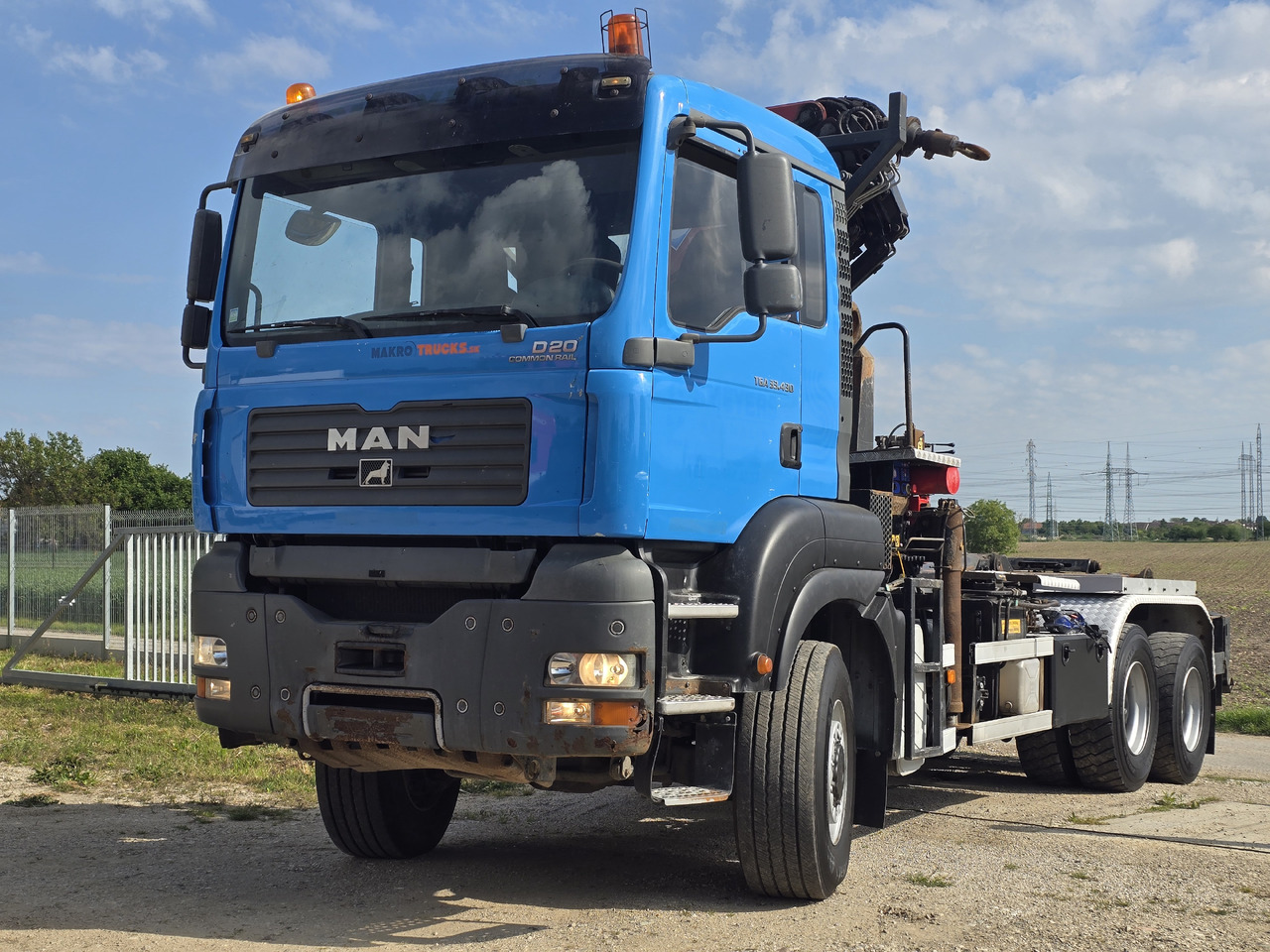 MAN TGA 33.430 6X6 / HMF 1823 K3+REM.CON./ HOOK SYSTEM - Abrollkipper, Autokran: das Bild 2 MAN TGA 33.430 6X6 / HMF 1823 K3+REM.CON./ HOOK SYSTEM - Abrollkipper, Autokran: das Bild 2