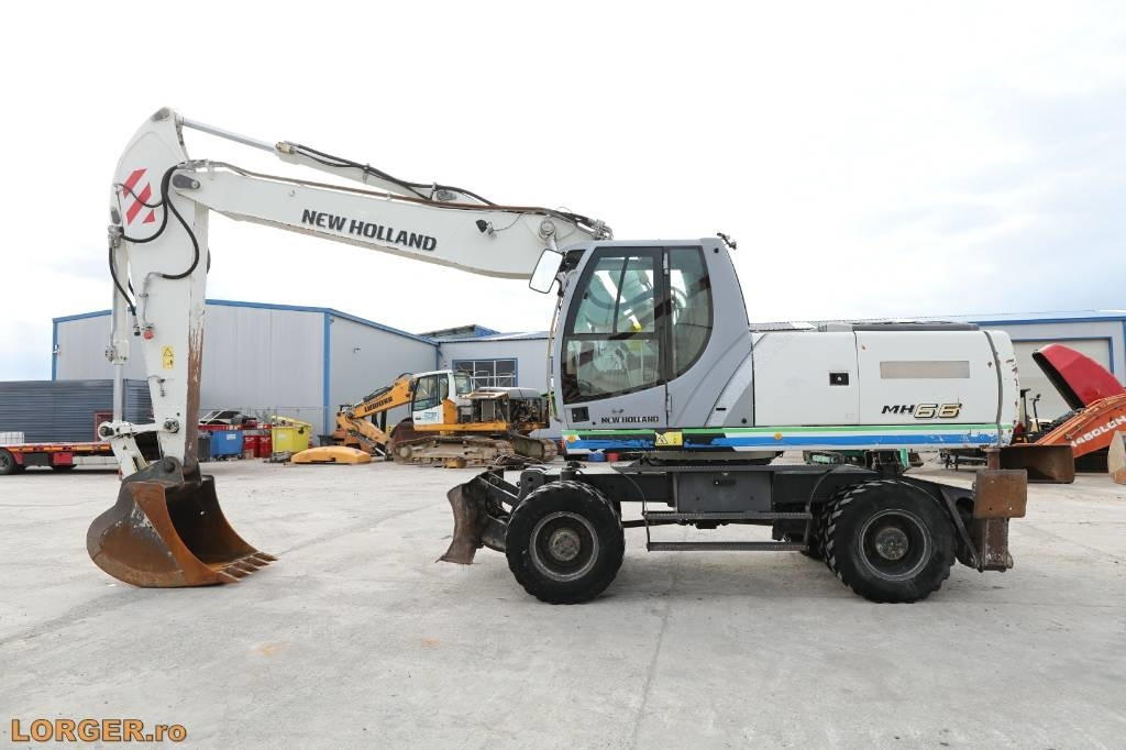 Mobilbagger New Holland MH 6.6 + Sandvic Hammer: das Bild 7