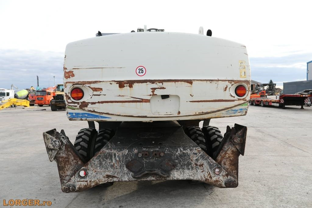 Mobilbagger New Holland MH 6.6 + Sandvic Hammer: das Bild 6