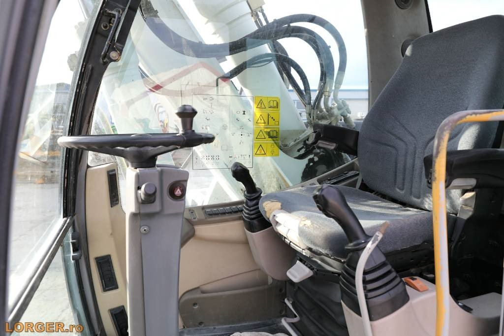 Mobilbagger New Holland MH 6.6 + Sandvic Hammer: das Bild 13