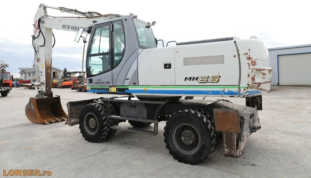 New Holland MH 6.6 + Sandvic Hammer - Mobilbagger: das Bild 3 New Holland MH 6.6 + Sandvic Hammer - Mobilbagger: das Bild 3
