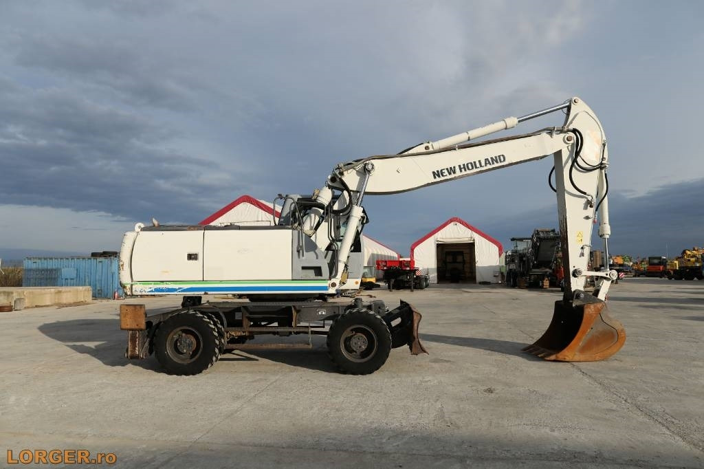 Mobilbagger New Holland MH 6.6 + Sandvic Hammer: das Bild 8