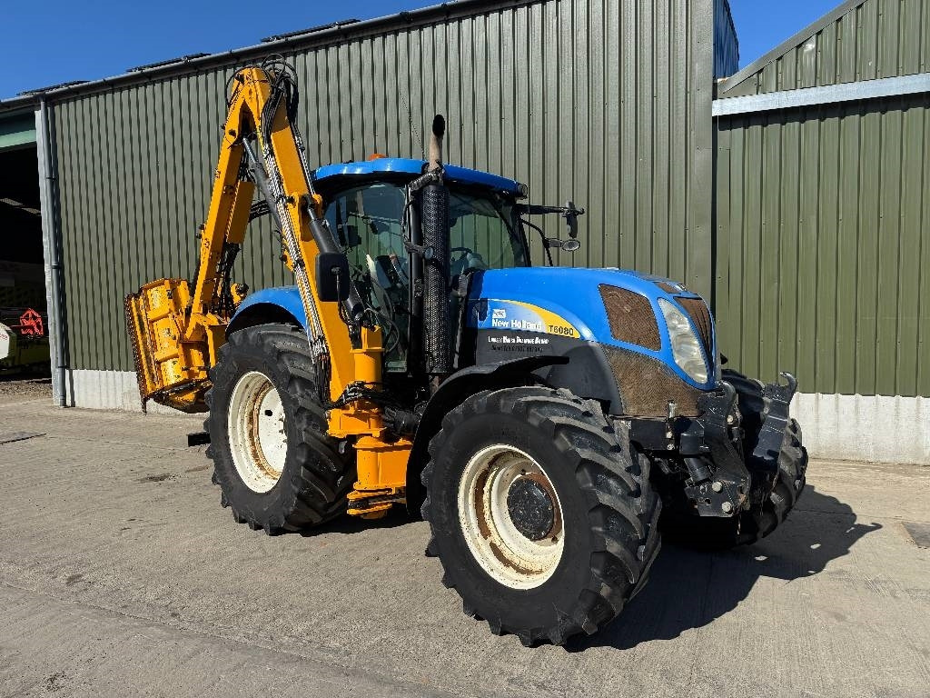 New Holland T6080 c/w Herder Cavalier - Schlegelmäher/ Mulcher: das Bild 3 New Holland T6080 c/w Herder Cavalier - Schlegelmäher/ Mulcher: das Bild 3