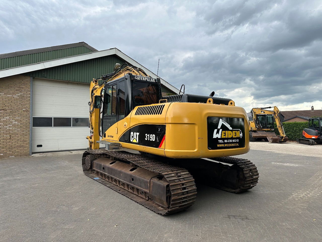Caterpillar 319D - Kettenbagger: das Bild 2 Caterpillar 319D - Kettenbagger: das Bild 2