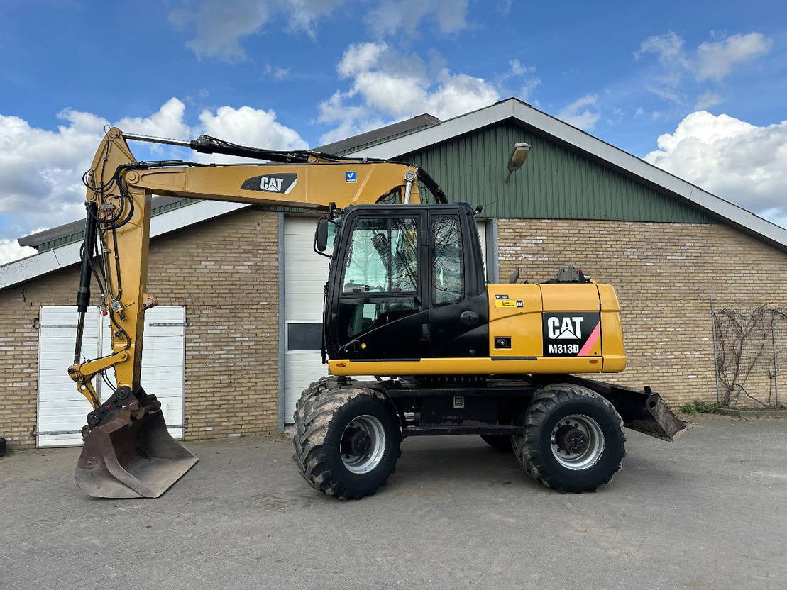 Caterpillar M313D - Mobilbagger: das Bild 1 Caterpillar M313D - Mobilbagger: das Bild 1