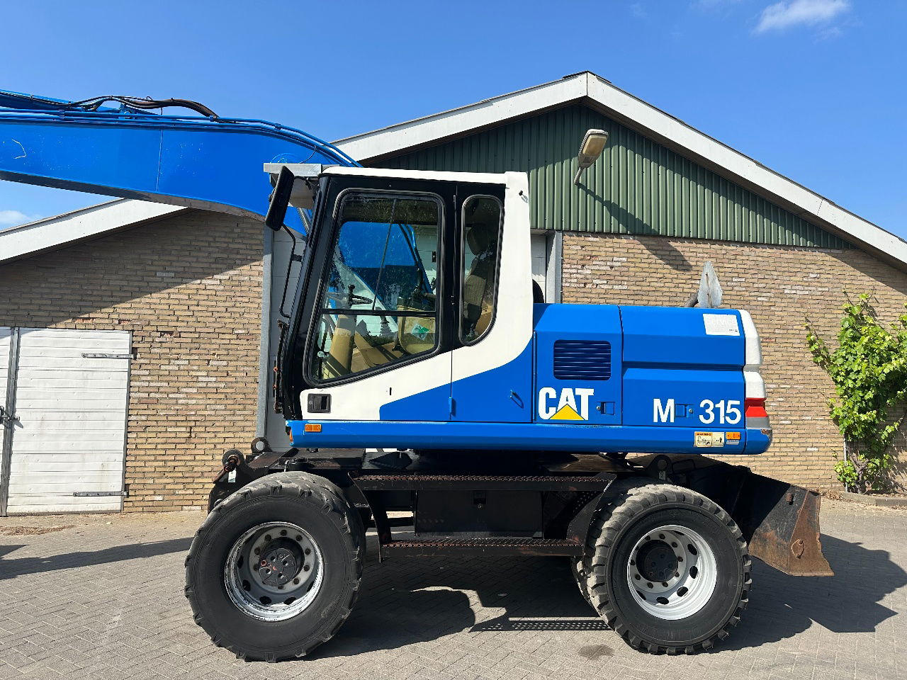 Caterpillar M315 - Mobilbagger: das Bild 2 Caterpillar M315 - Mobilbagger: das Bild 2