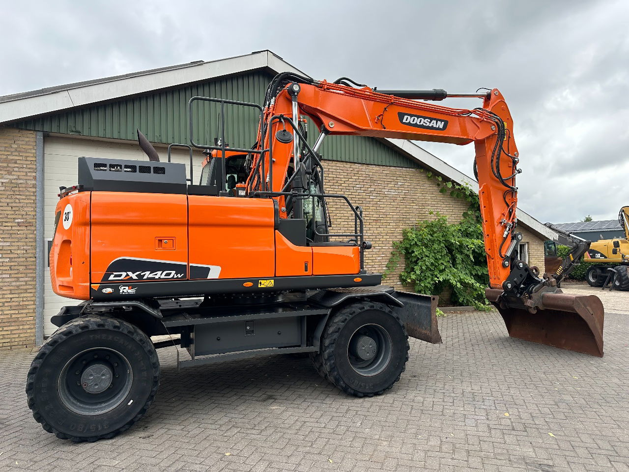 Mobilbagger Doosan DX140W-5: das Bild 7