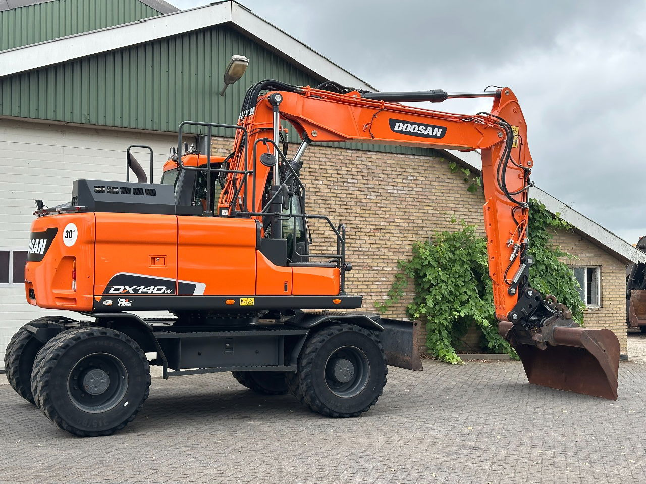 Mobilbagger Doosan DX140W-5: das Bild 6