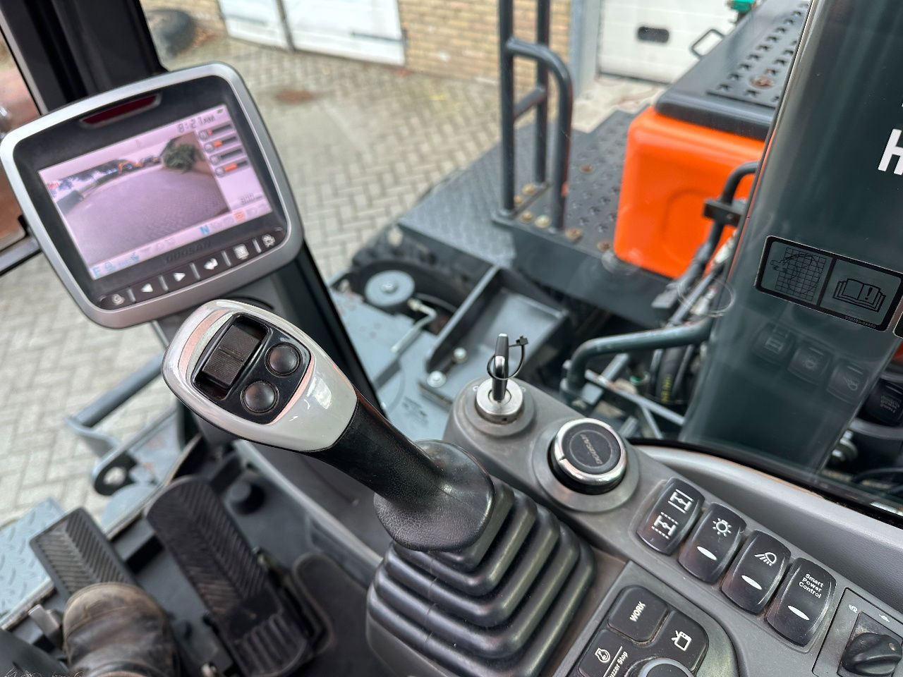 Mobilbagger Doosan DX140W-5: das Bild 14