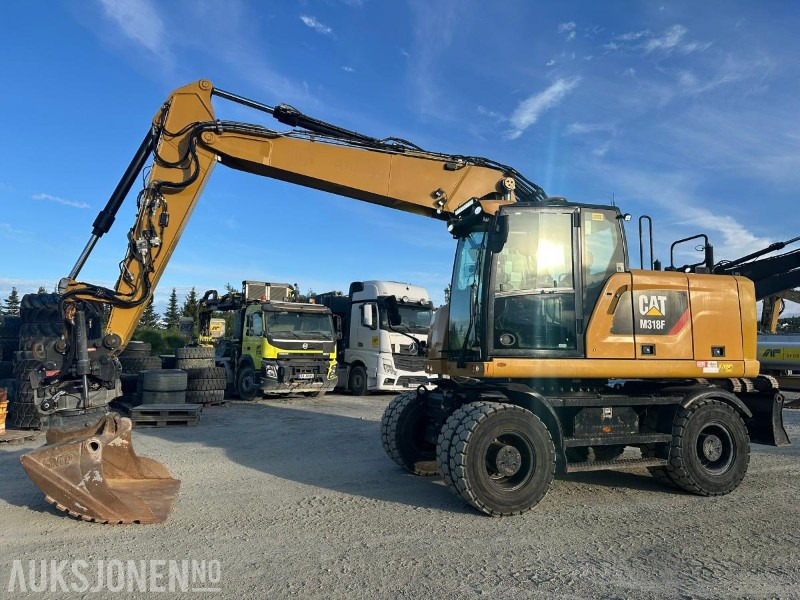 2019 Cat M318F hjulgraver med tiltrotator og skuff - Bagger: das Bild 2 2019 Cat M318F hjulgraver med tiltrotator og skuff - Bagger: das Bild 2