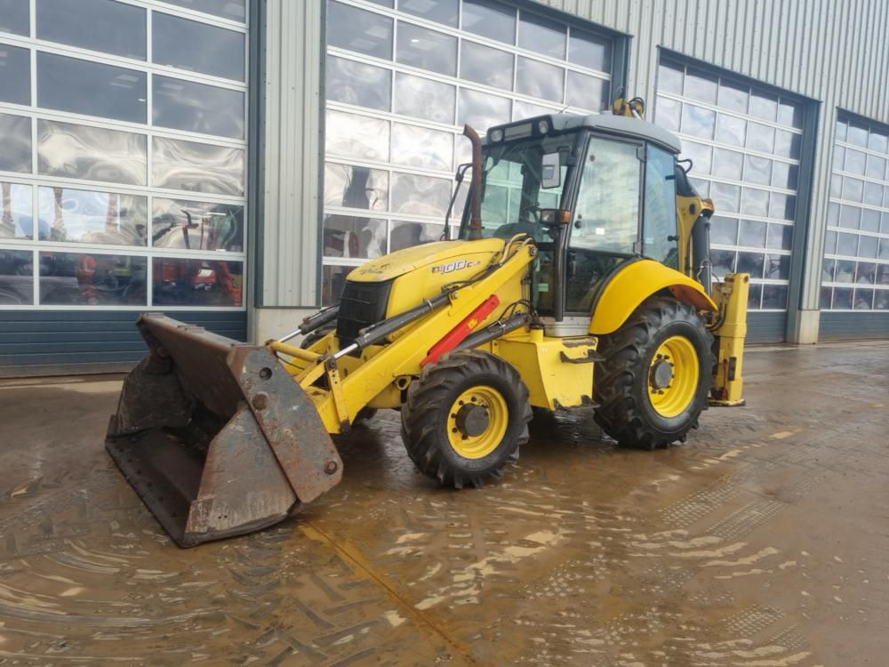 NEW HOLLAND B100C - Baggerlader: das Bild 1 NEW HOLLAND B100C - Baggerlader: das Bild 1