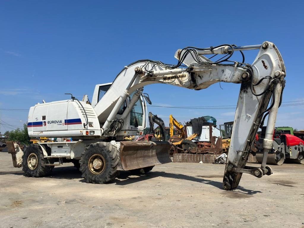 New Holland MH Plus - Mobilbagger: das Bild 1 New Holland MH Plus - Mobilbagger: das Bild 1