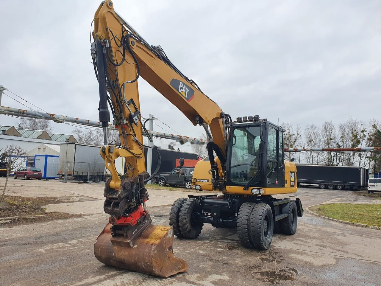 Caterpillar M 313 D Tiltrotator - Mobilbagger: das Bild 4 Caterpillar M 313 D Tiltrotator - Mobilbagger: das Bild 4