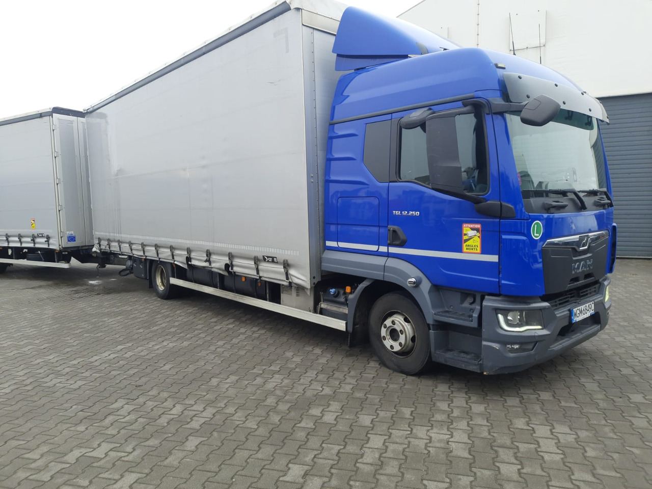 MAN TGL 12.250 - Plane LKW: das Bild 1 MAN TGL 12.250 - Plane LKW: das Bild 1