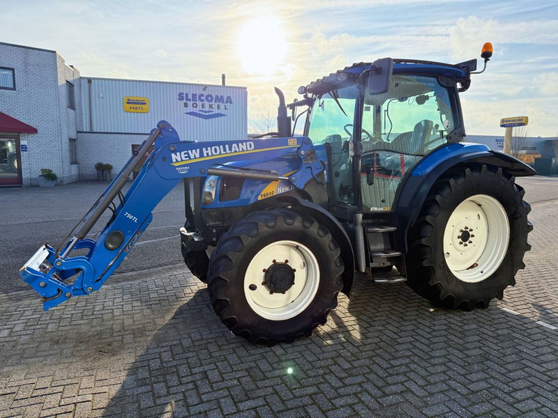 New Holland T6010 Plus + 750TL Voorlader - Traktor: das Bild 1 New Holland T6010 Plus + 750TL Voorlader - Traktor: das Bild 1