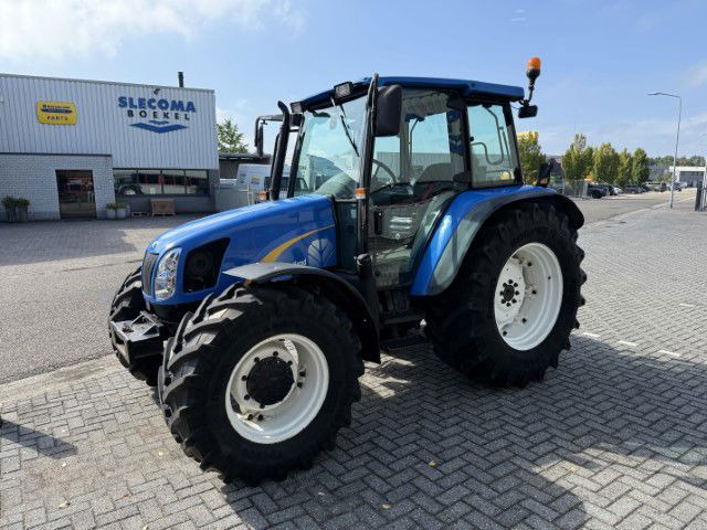New Holland TL90A 4WD - Traktor: das Bild 1 New Holland TL90A 4WD - Traktor: das Bild 1