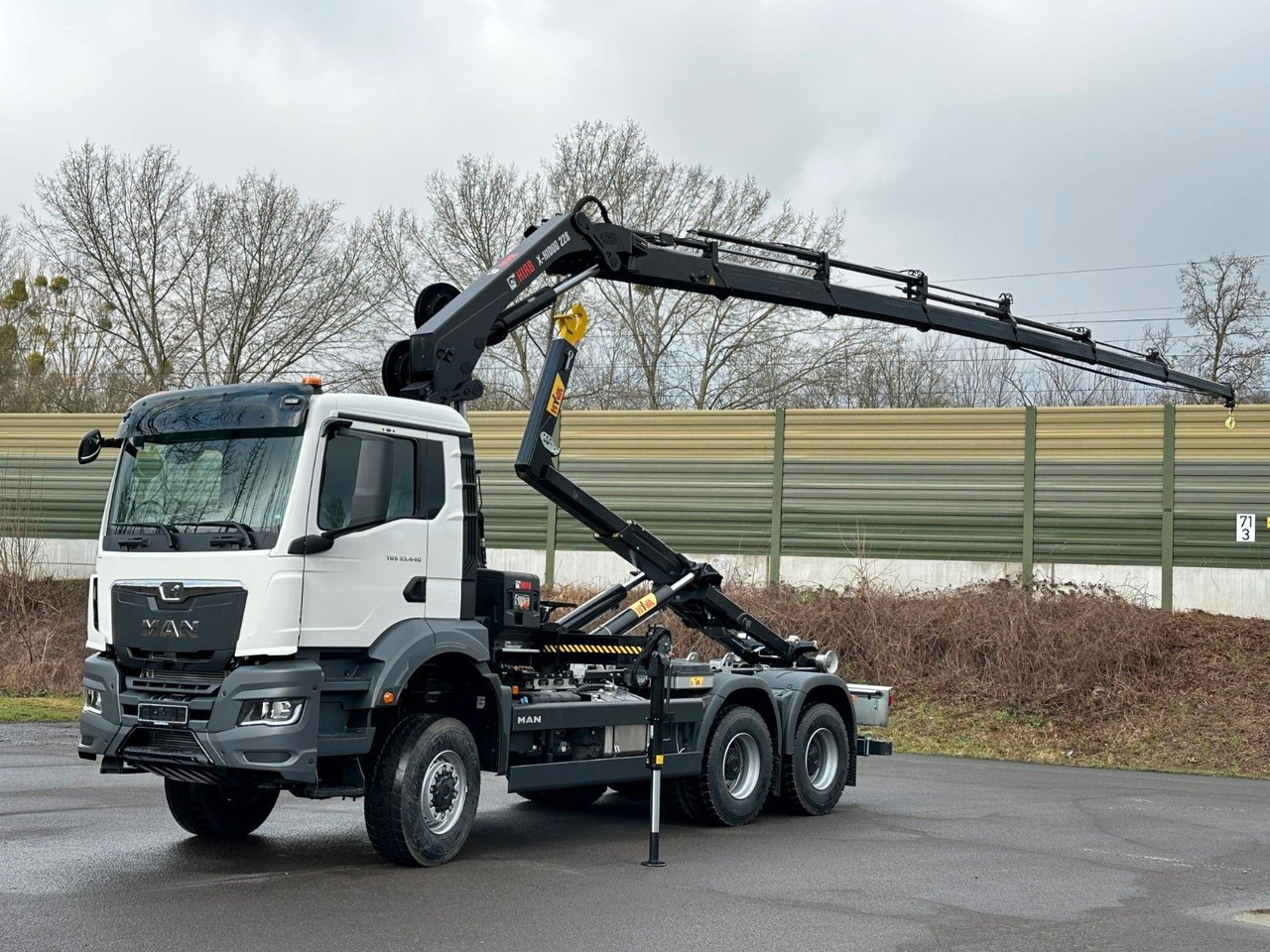 MAN TGS 33.440 6x6 BB Abrollkipper+Kran Hiab 228-6 - Abrollkipper, Autokran: das Bild 1 MAN TGS 33.440 6x6 BB Abrollkipper+Kran Hiab 228-6 - Abrollkipper, Autokran: das Bild 1