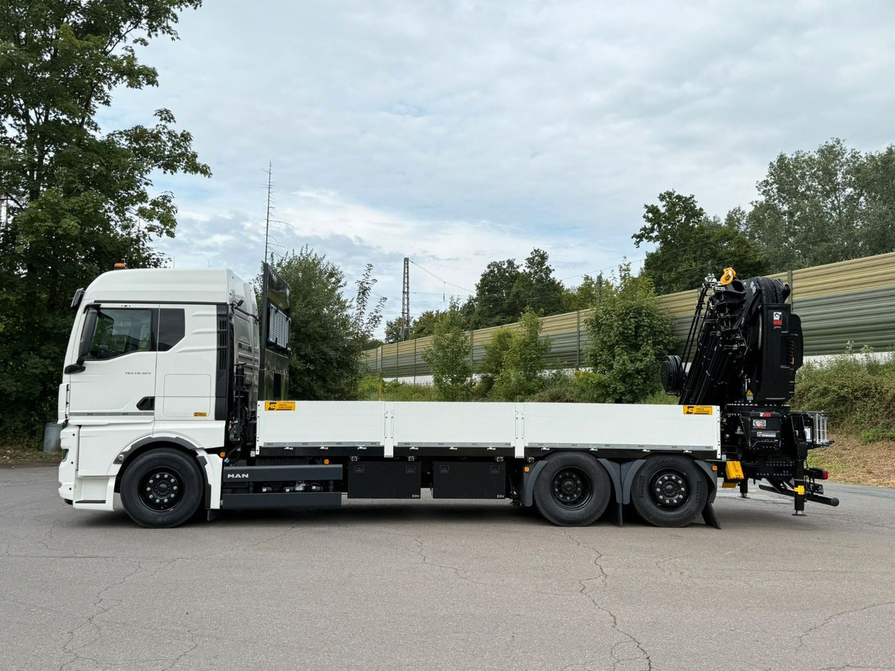 MAN TGX 26.520 TG3 Retarder / 6X2 Hiab 548 E 8 - Autokran: das Bild 4 MAN TGX 26.520 TG3 Retarder / 6X2 Hiab 548 E 8 - Autokran: das Bild 4