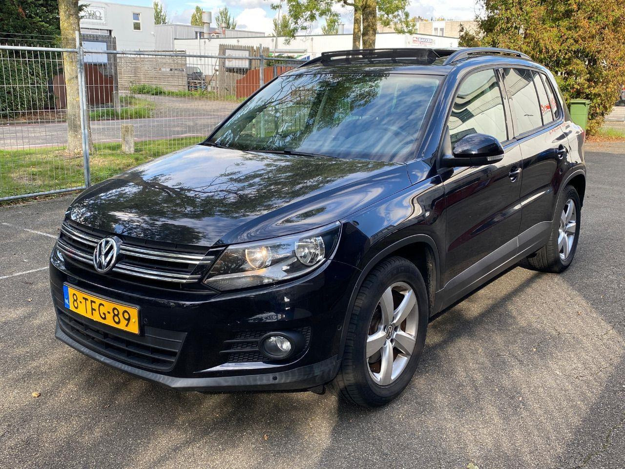Volkswagen Tiguan 1.4 TSI Comfort&Design Edition | 2014 | 82.628 km | 8TFG89 | NAP: Logisch - SUV/ Geländewagen: das Bild 1 Volkswagen Tiguan 1.4 TSI Comfort&Design Edition | 2014 | 82.628 km | 8TFG89 | NAP: Logisch - SUV/ Geländewagen: das Bild 1