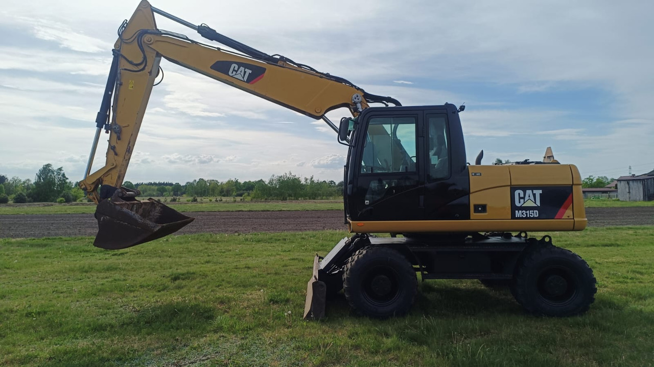 Caterpillar M315D - Kettenbagger: das Bild 1 Caterpillar M315D - Kettenbagger: das Bild 1