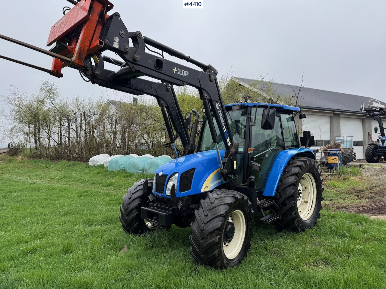 2006 New Holland TL100 A w/Front Loader. - Traktor: das Bild 1 2006 New Holland TL100 A w/Front Loader. - Traktor: das Bild 1