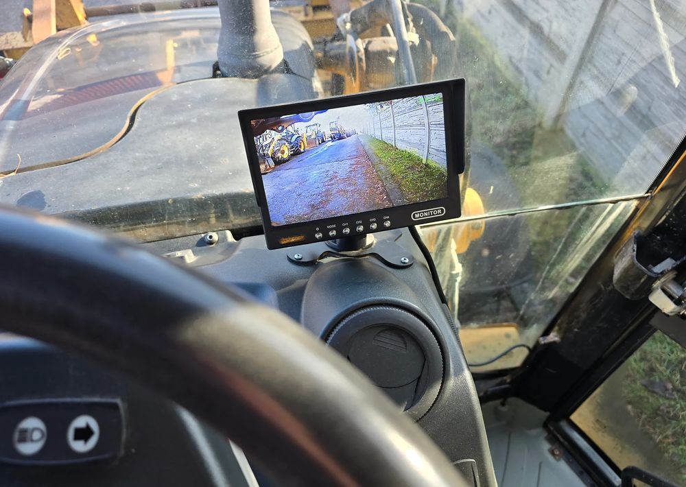 Caterpillar - Baggerlader: das Bild 4 Caterpillar - Baggerlader: das Bild 4