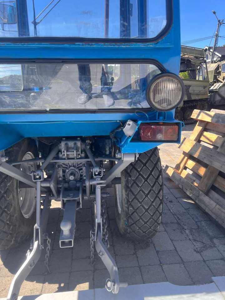 Iseki TX1500 brøyteskjær og feiekost - Traktor: das Bild 2 Iseki TX1500 brøyteskjær og feiekost - Traktor: das Bild 2
