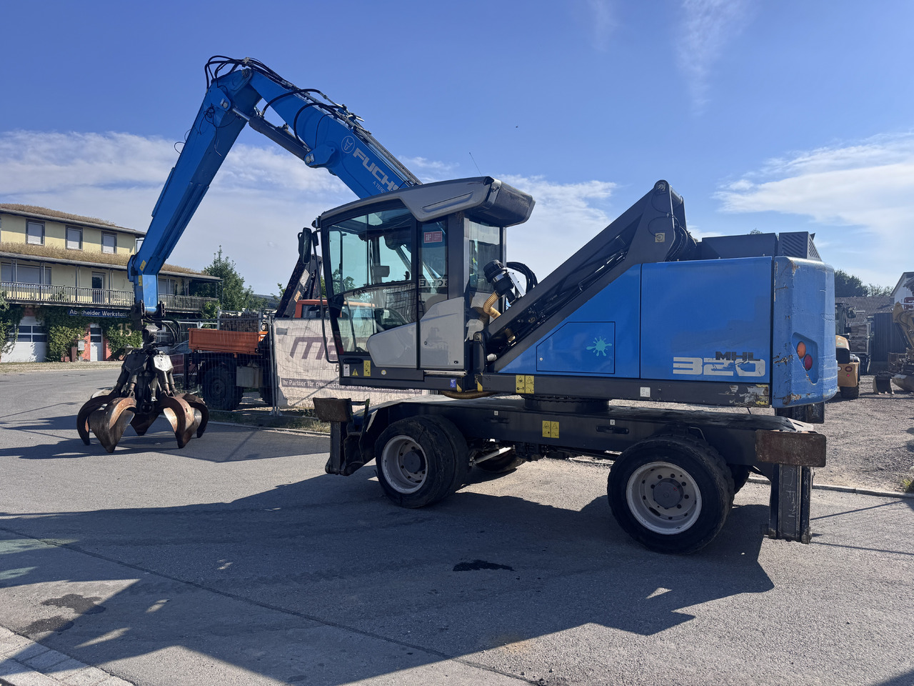 FUCHS MHL 320 F - Umschlagbagger: das Bild 1 FUCHS MHL 320 F - Umschlagbagger: das Bild 1