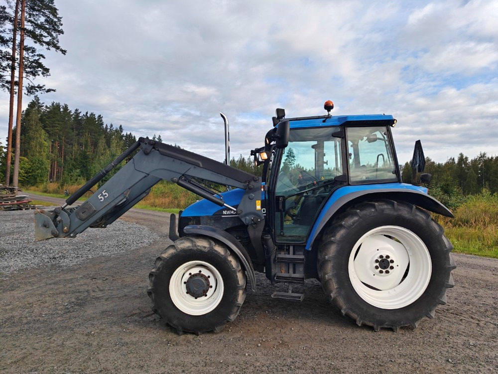 New Holland TS100, ES vaihteisto, ilmastointi, etukuormaaja Ålö Q55, katso video! - Traktor: das Bild 2 New Holland TS100, ES vaihteisto, ilmastointi, etukuormaaja Ålö Q55, katso video! - Traktor: das Bild 2