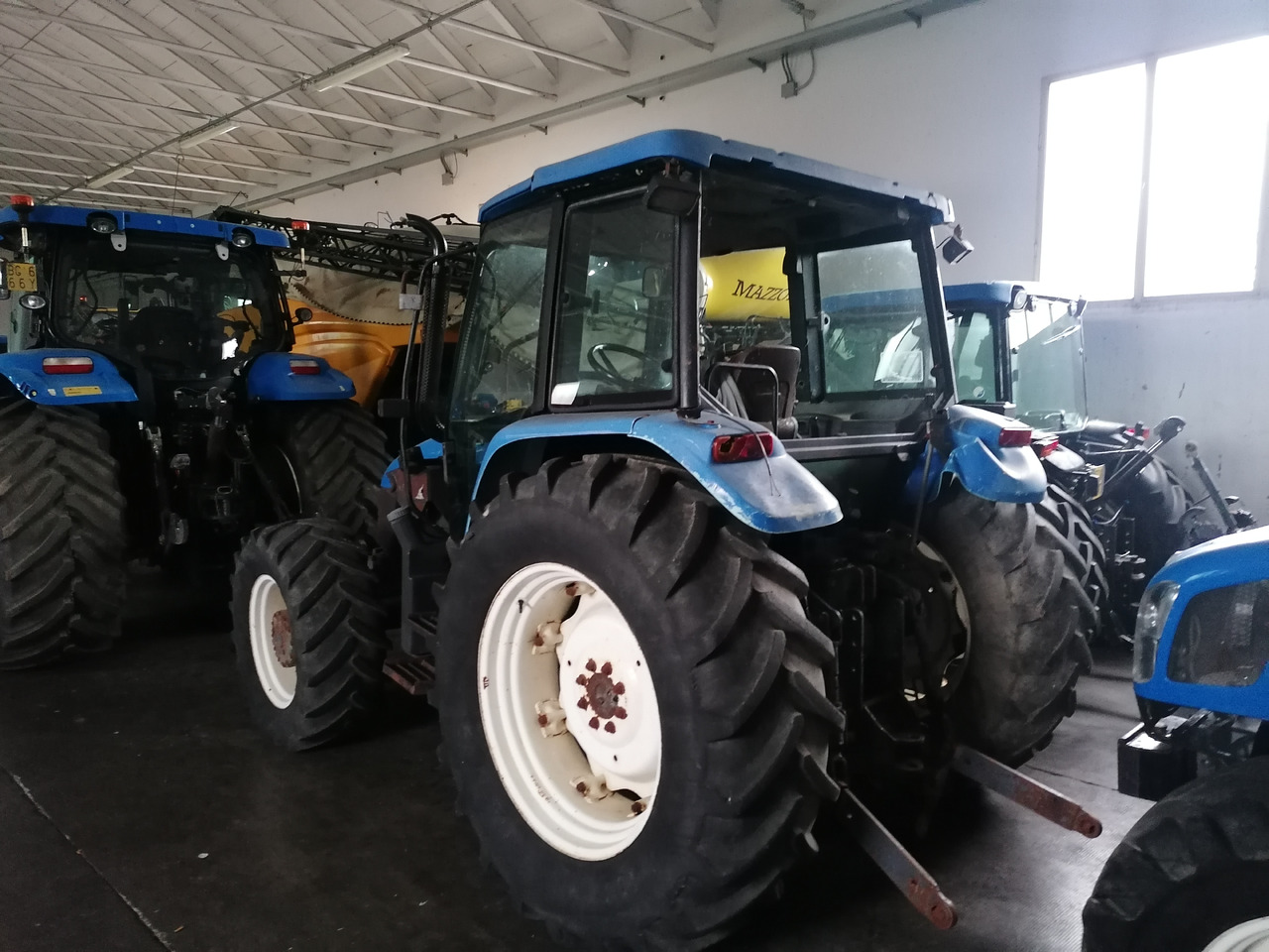 NEW HOLLAND TL 90 - Traktor: das Bild 5 NEW HOLLAND TL 90 - Traktor: das Bild 5