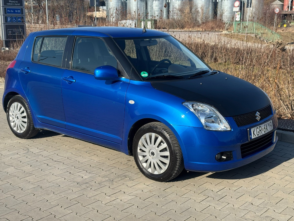 Suzuki Swift 1.3 benzyna 90km Klimatyzacja 136tys przebieg Auto prywatne zadbane - PKW: das Bild 2 Suzuki Swift 1.3 benzyna 90km Klimatyzacja 136tys przebieg Auto prywatne zadbane - PKW: das Bild 2