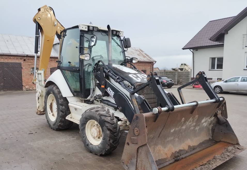 CAT Caterpillar 428E - Baggerlader: das Bild 4 CAT Caterpillar 428E - Baggerlader: das Bild 4