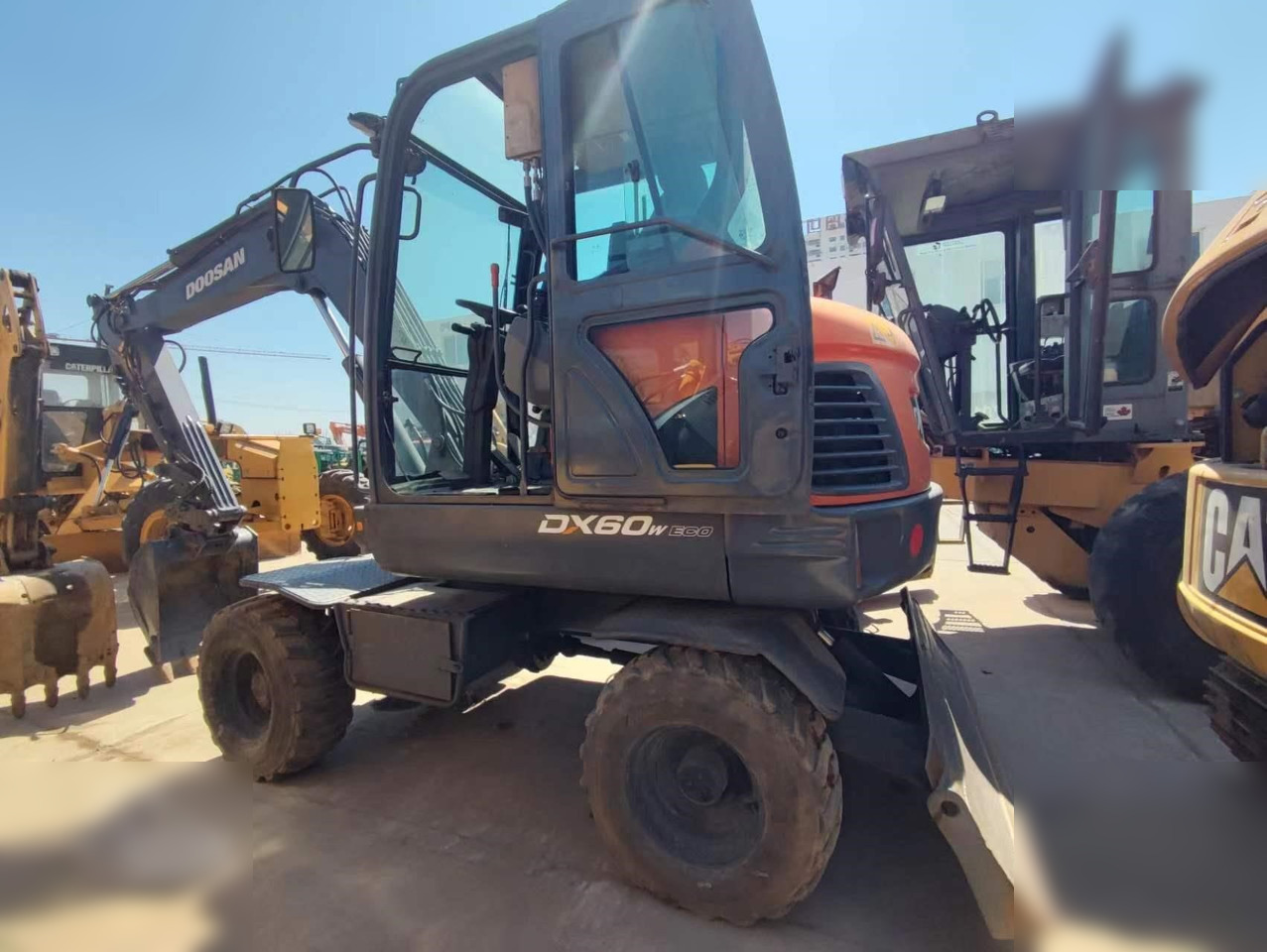 DOOSAN DX60W ECO - Mobilbagger: das Bild 1 DOOSAN DX60W ECO - Mobilbagger: das Bild 1