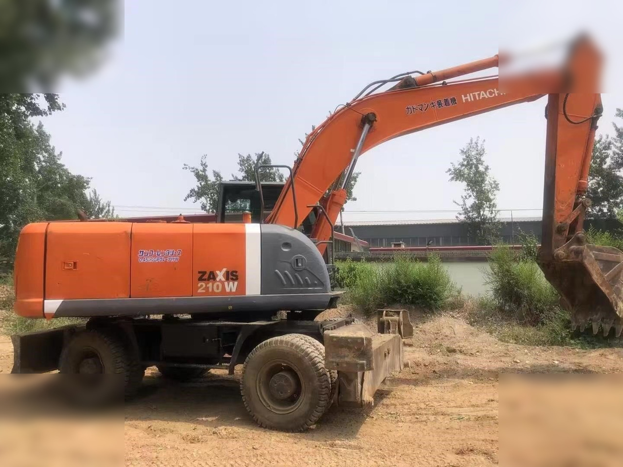 HITACHI ZX210W - Mobilbagger: das Bild 2 HITACHI ZX210W - Mobilbagger: das Bild 2