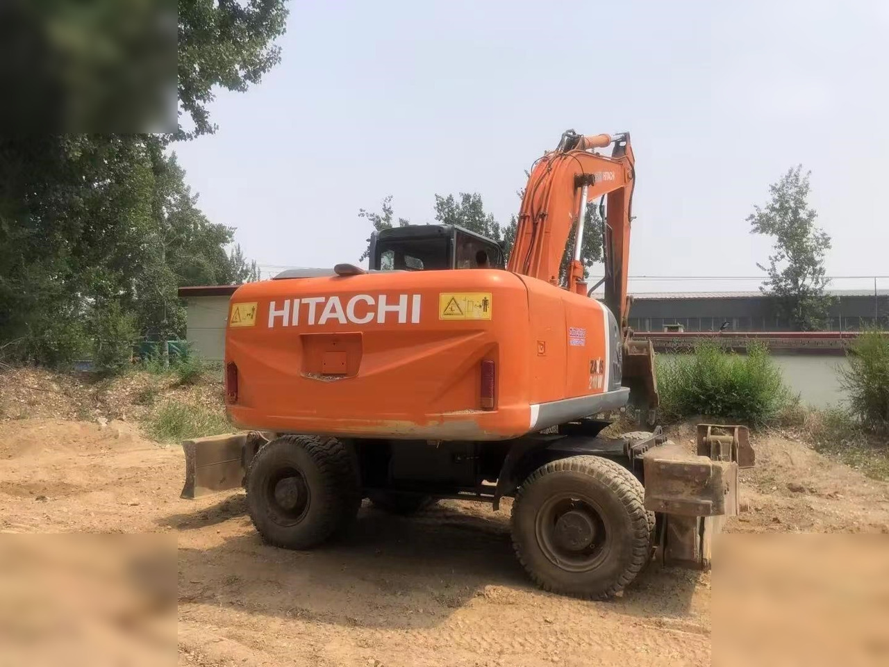 HITACHI ZX210W - Mobilbagger: das Bild 5 HITACHI ZX210W - Mobilbagger: das Bild 5