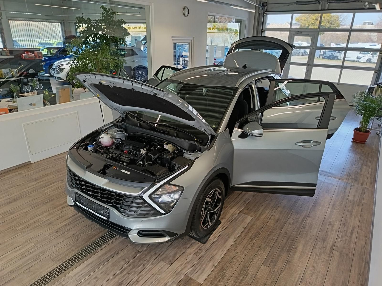 Kia Sportage 1.6 T-GDI DCT Vision*NAVI*LED*R-KAM*DAB - SUV/ Geländewagen: das Bild 2 Kia Sportage 1.6 T-GDI DCT Vision*NAVI*LED*R-KAM*DAB - SUV/ Geländewagen: das Bild 2