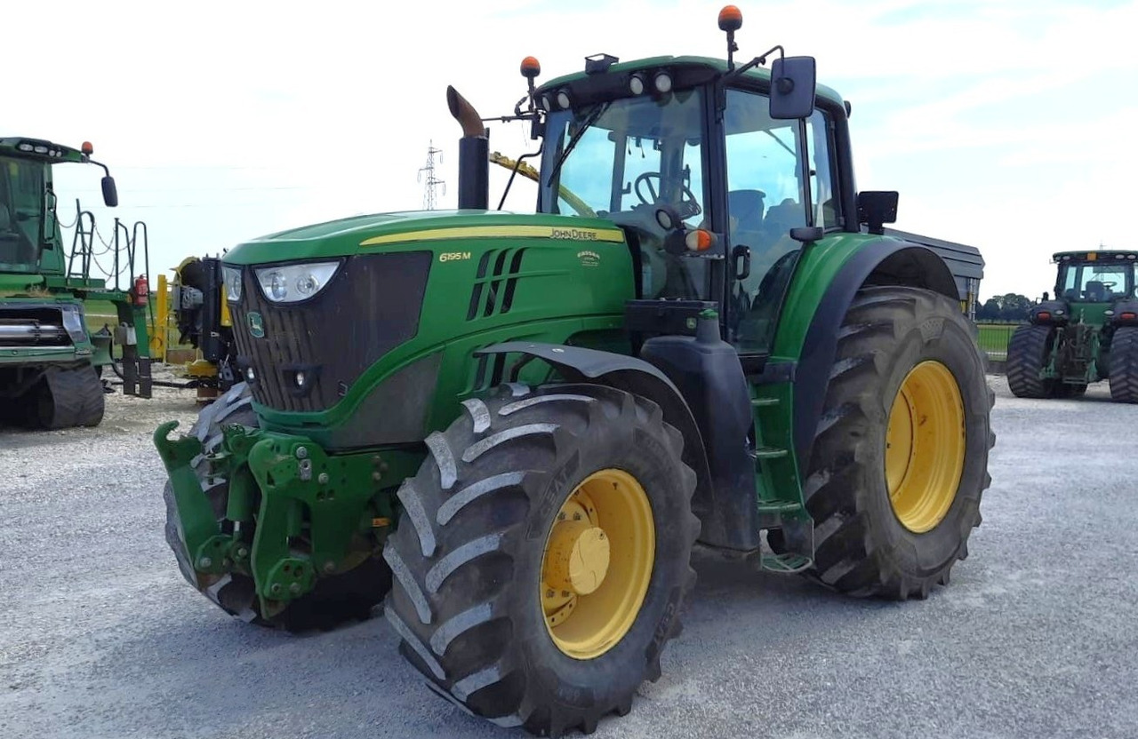JOHN DEERE 6195 M - Traktor: das Bild 1 JOHN DEERE 6195 M - Traktor: das Bild 1