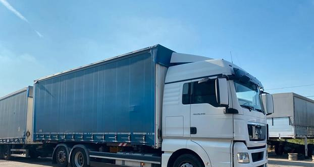 MAN TGX 26.440 CASSONE CENTINATO 3 ASSI - Plane LKW: das Bild 1 MAN TGX 26.440 CASSONE CENTINATO 3 ASSI - Plane LKW: das Bild 1