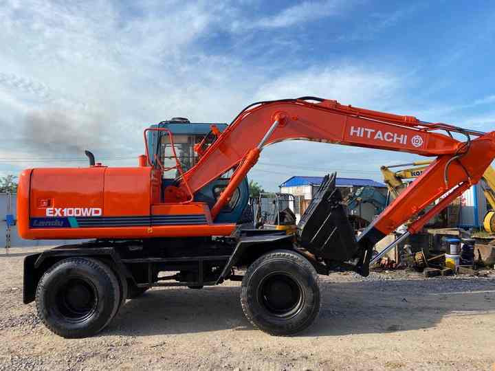 Used Hitachi Ex100WD Wheel Excavator for Sale Japan Made Hitachi Ex100wd Wheeled Excavator for Sale - Mobilbagger: das Bild 2 Used Hitachi Ex100WD Wheel Excavator for Sale Japan Made Hitachi Ex100wd Wheeled Excavator for Sale - Mobilbagger: das Bild 2