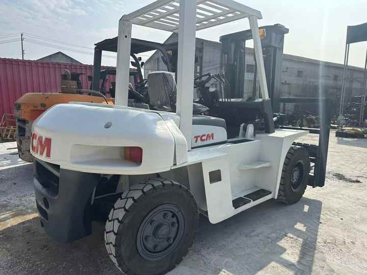 High Quality TCM 7 Ton with Hydraulic Distance Adjustment Used Forklift in Stock Used tcm Forklift 7 Ton Used tcm Fd70 Forklift - Gabelstapler: das Bild 2 High Quality TCM 7 Ton with Hydraulic Distance Adjustment Used Forklift in Stock Used tcm Forklift 7 Ton Used tcm Fd70 Forklift - Gabelstapler: das Bild 2