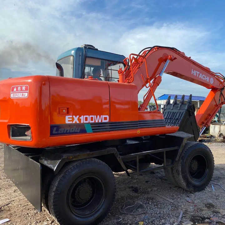 Used Hitachi Ex100WD Wheel Excavator for Sale Japan Made Hitachi Ex100wd Wheeled Excavator for Sale - Kettenbagger: das Bild 1 Used Hitachi Ex100WD Wheel Excavator for Sale Japan Made Hitachi Ex100wd Wheeled Excavator for Sale - Kettenbagger: das Bild 1