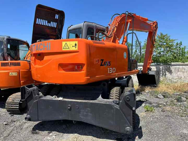 Used Wheel Excavator Hitachi ZX 130W Made in Japan 13tonHitachi Zx130w Wheel Excavator Price Used Hitachi Zx130 Excavator SALE - Bagger: das Bild 2 Used Wheel Excavator Hitachi ZX 130W Made in Japan 13tonHitachi Zx130w Wheel Excavator Price Used Hitachi Zx130 Excavator SALE - Bagger: das Bild 2