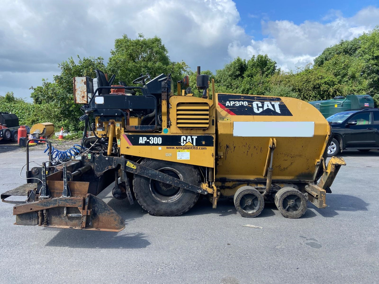 Bagger CATERPILLAR AP300: das Bild 6