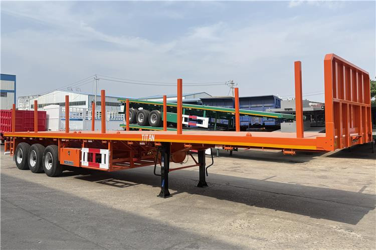 TITAN Container Flatbed Truck Trailer with Piles In Angola - Container/ Wechselfahrgestell Auflieger: das Bild 1 TITAN Container Flatbed Truck Trailer with Piles In Angola - Container/ Wechselfahrgestell Auflieger: das Bild 1