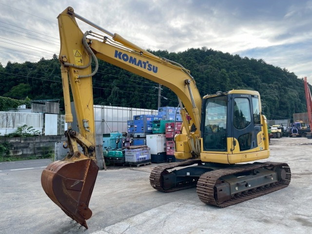 KOMATSU PC128US-10 - Kettenbagger: das Bild 1 KOMATSU PC128US-10 - Kettenbagger: das Bild 1