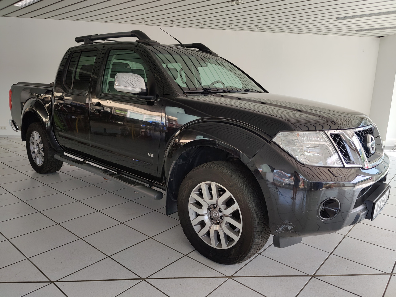 Nissan Navara Pickup (D40M)(05.2005->) Double Cab LE V6 4X4 Navi Kam Leder SHZ AHK - Pick-up: das Bild 2 Nissan Navara Pickup (D40M)(05.2005->) Double Cab LE V6 4X4 Navi Kam Leder SHZ AHK - Pick-up: das Bild 2