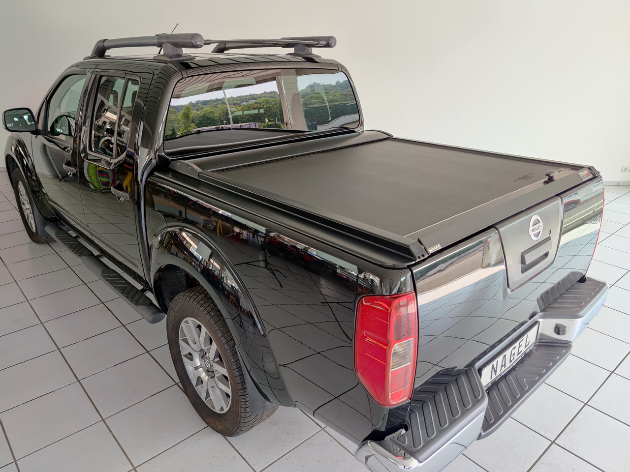 Nissan Navara Pickup (D40M)(05.2005->) Double Cab LE V6 4X4 Navi Kam Leder SHZ AHK - Pick-up: das Bild 5 Nissan Navara Pickup (D40M)(05.2005->) Double Cab LE V6 4X4 Navi Kam Leder SHZ AHK - Pick-up: das Bild 5